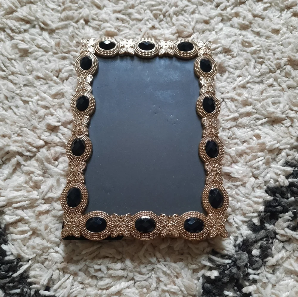 Gold tone metal picture frame